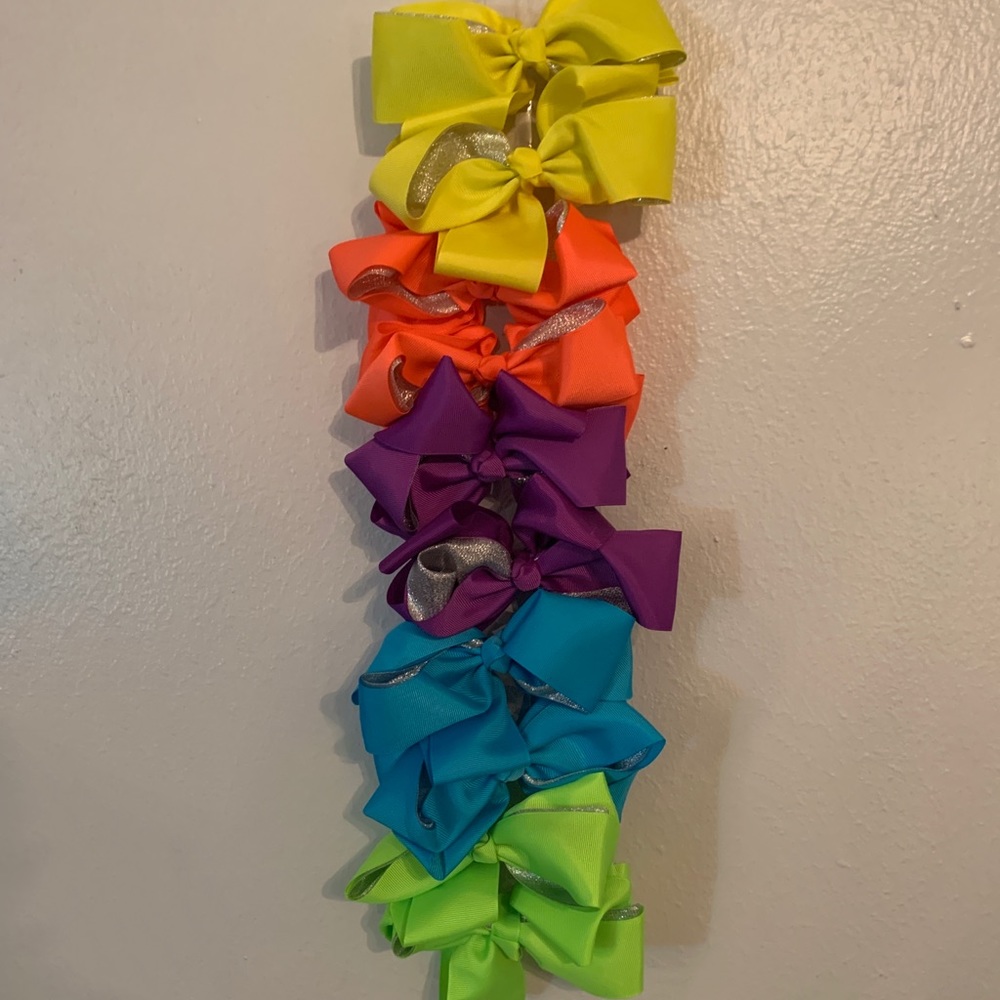 Multiple colored bows with sparkles silver in bow